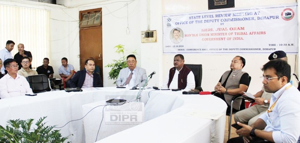 Union Minister Jual Oram along with state officials during the state-level review meeting at the Deputy Commissioner’s office in Dimapur on October 15. (DIPR Photo)
